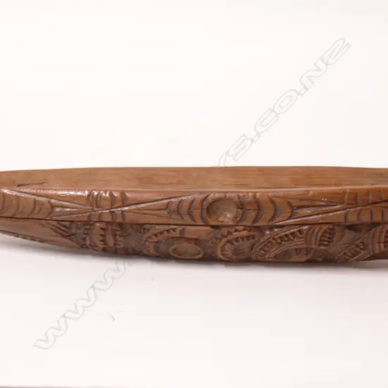 An early 20thC carved small model waka