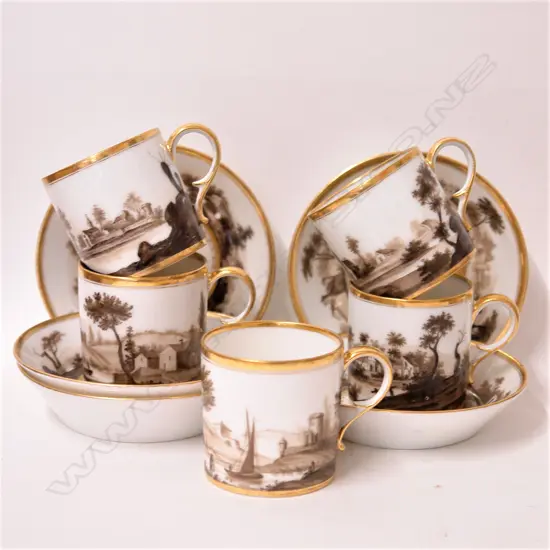 An early 20thC grisaille landscape painted part-coffee set