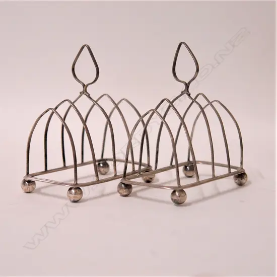 A pair of c.1900 Chinese silver toast racks