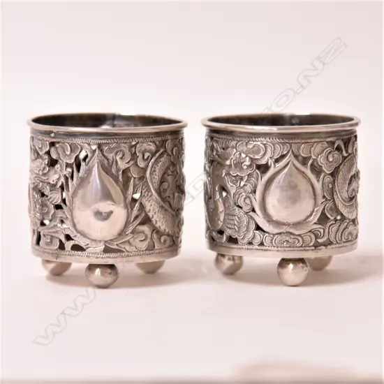A pair of c.1880 Chinese silver Luck Hing small candle holders