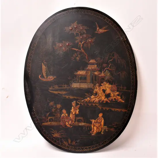 A 19thC Chinese papier maché oval panel