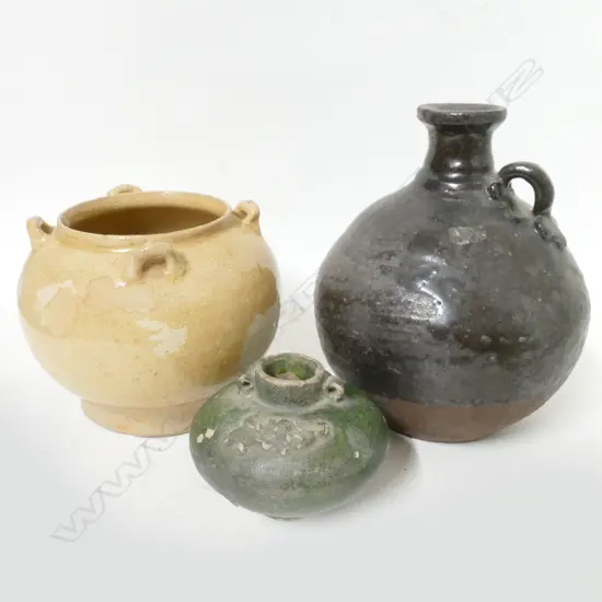 A Chinese pottery jar; a ewer and a small jarlet