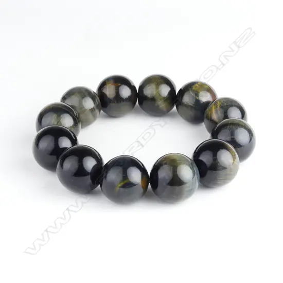 A chrysoberyl 'cat's eye' bead bracelet