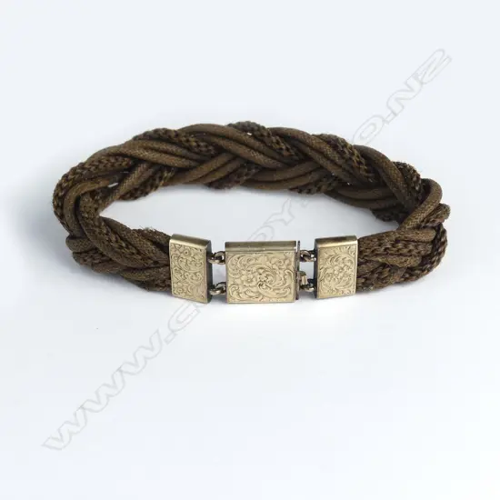 A Victorian fine plaited hair and 10ct. yellow gold mounted bracelet