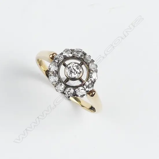 An antique 18ct. yellow gold and diamond cluster ring