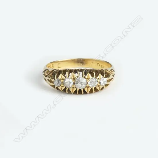 An estate 18ct. yellow gold and five stone diamond ring