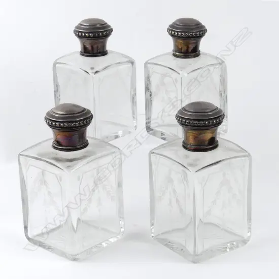 Four early 1900s French dressing table bottles