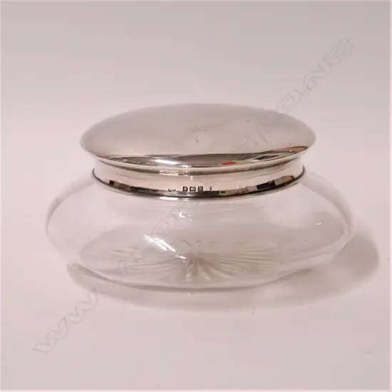 A 1920s large silver topped cut glass vanity jar