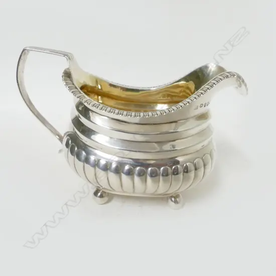 A George III silver milk jug