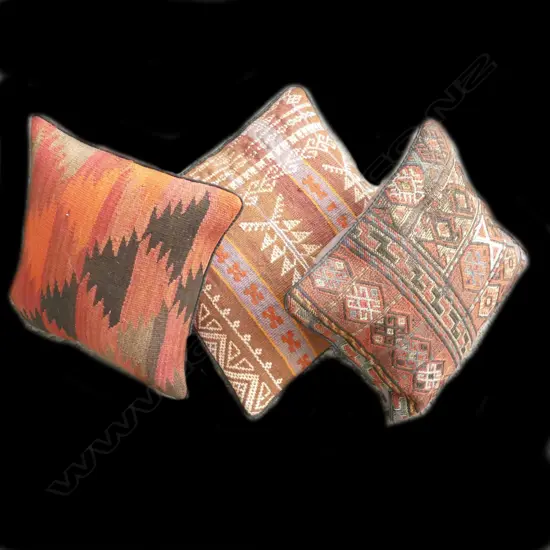 Three kilim faced cushions