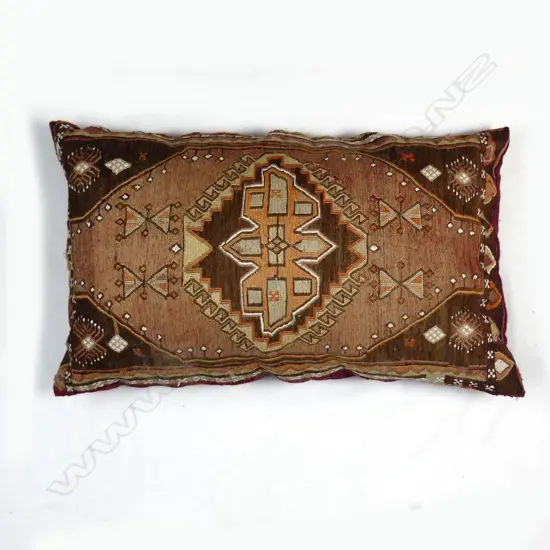 A kilim bolster cushion