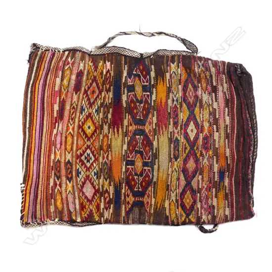 An antique Turkish kilim faced large bedding bag