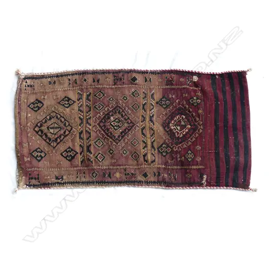 An old Anatolian kilim face bedding bag