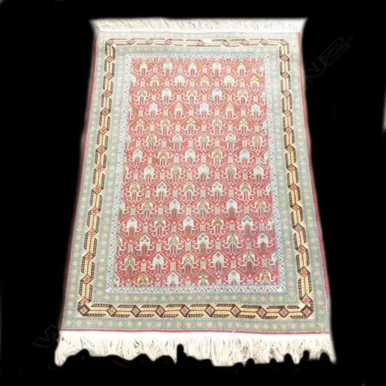 A Caucasian hand knotted rug