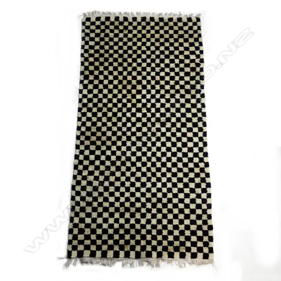 A hand knotted Tibetan chequerboard meditation rug