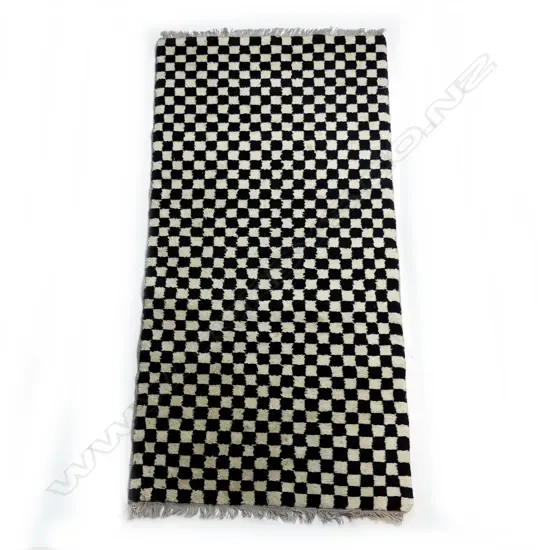 A hand knotted Tibetan chequerboard meditation rug