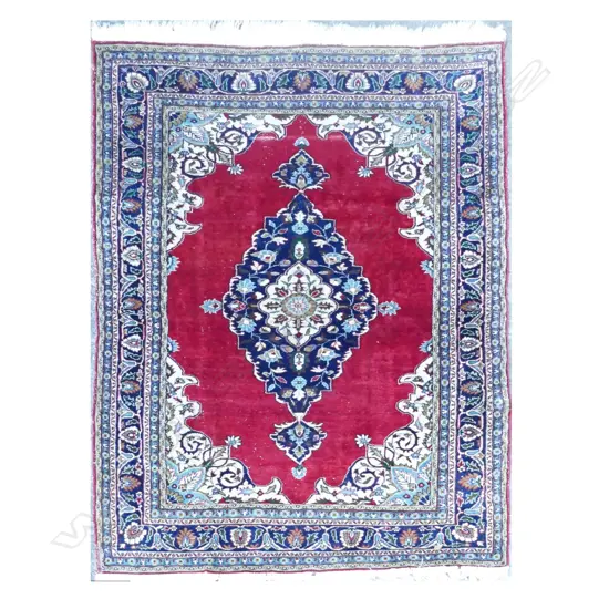 A hand knotted Persian rug