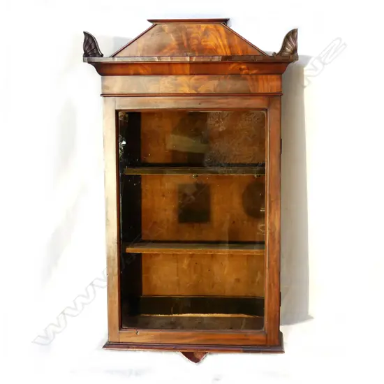 A William IV flame mahogany wall cabinet