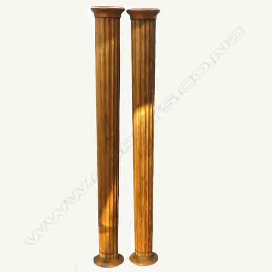 A pair of oak Doric pilasters