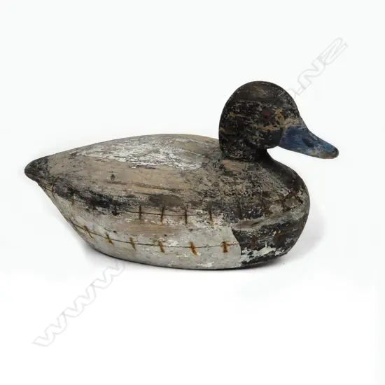 A c.1920 carved wooden 13½" duck decoy