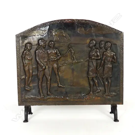 An old copper fire screen