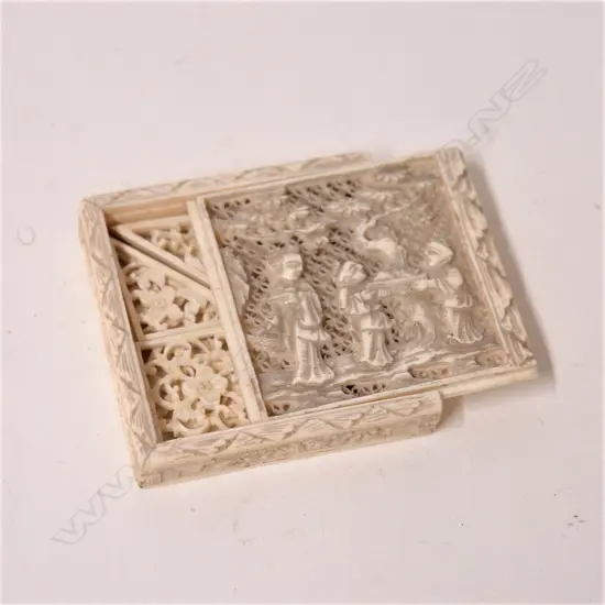 A 19thC Chinese finely carved ivory tangram puzzle