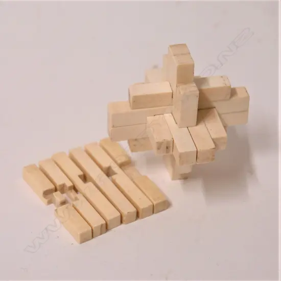 A c.1900 carved ivory sectional box puzzle