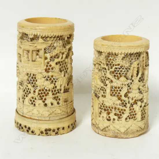 A pair of 19thC Chinese carved ivory brush pots