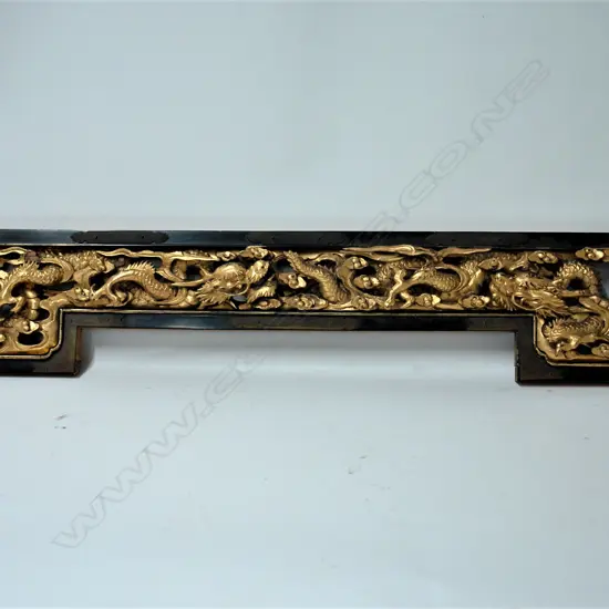 A 19thC Chinese gilded carved and pierced shaped wood panel