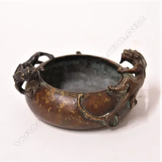 A Chinese bronze brush washer