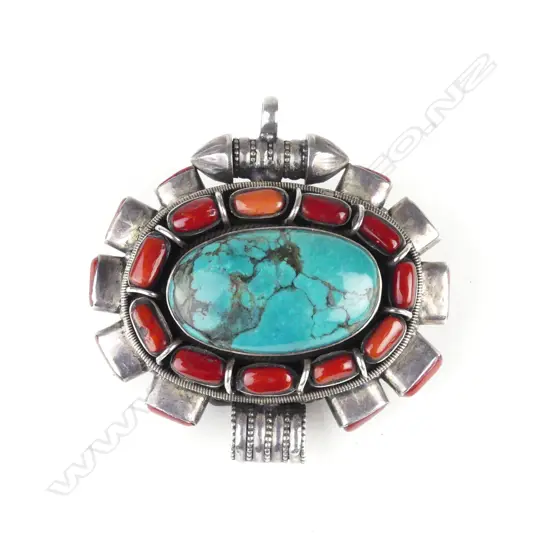 A vintage Afghani silver red coral and turquoise large pendant