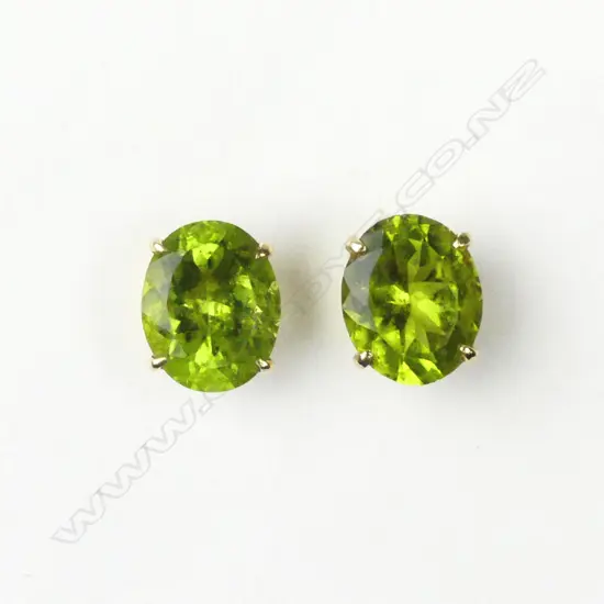 A pair of 18ct gold and peridot stud earrings