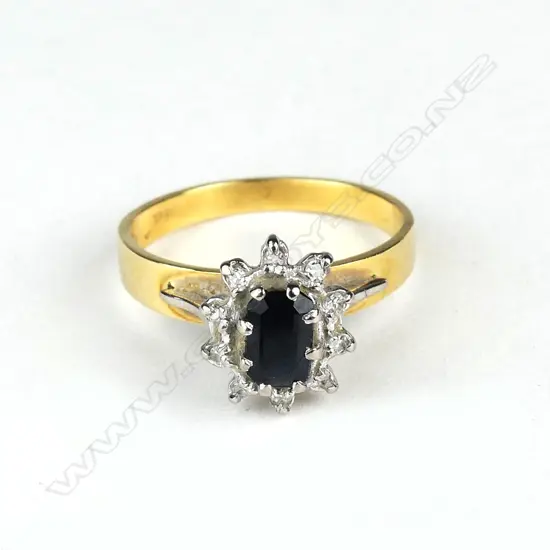 A lady's vintage 18ct. gold sapphire and diamond cluster ring