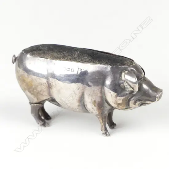 An uncommon Edwardian silver large pig shaped pin cushion