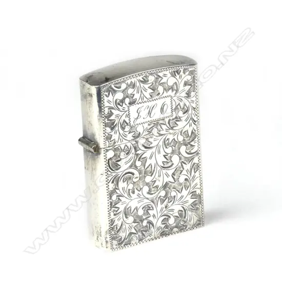 A silver cased Zippo lighter