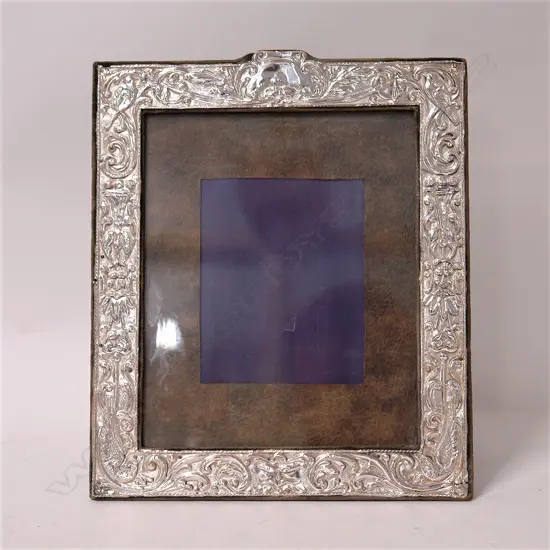 An Edwardian large silver decorative photo frame