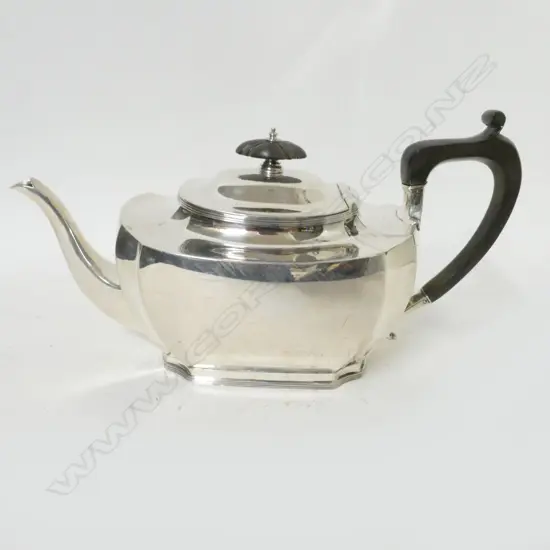 A silver tea pot