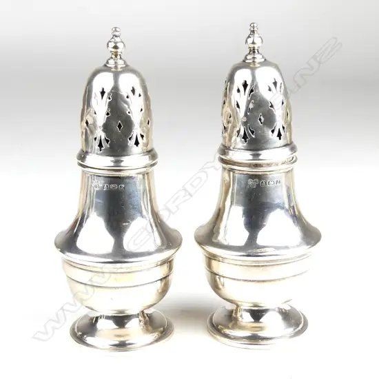 A pair of silver sugar casters