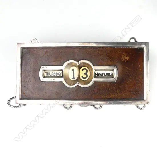 An Edwardian silver wall calendar