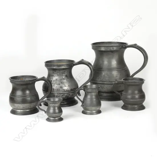 A set of six graduated pewter mugs