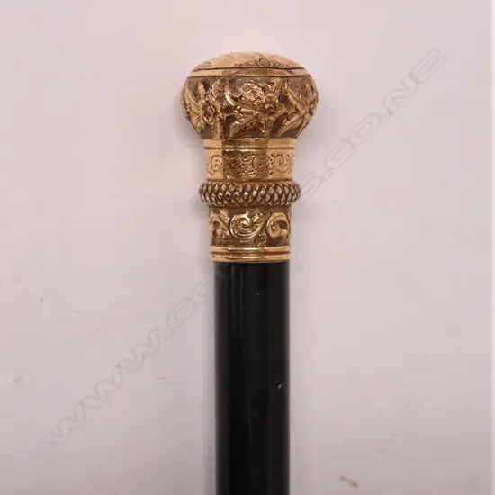 A 19thC fancy gold plated handled ebonised walking stick