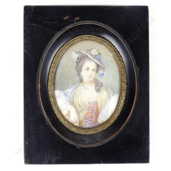 A hand painted portrait miniature on ivory