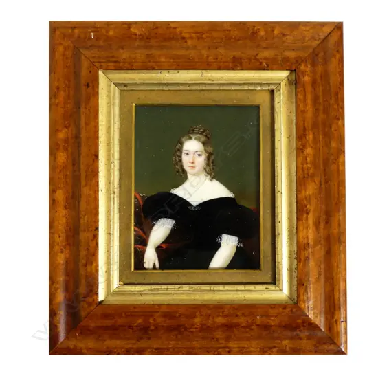 A hand painted portrait miniature on ivory