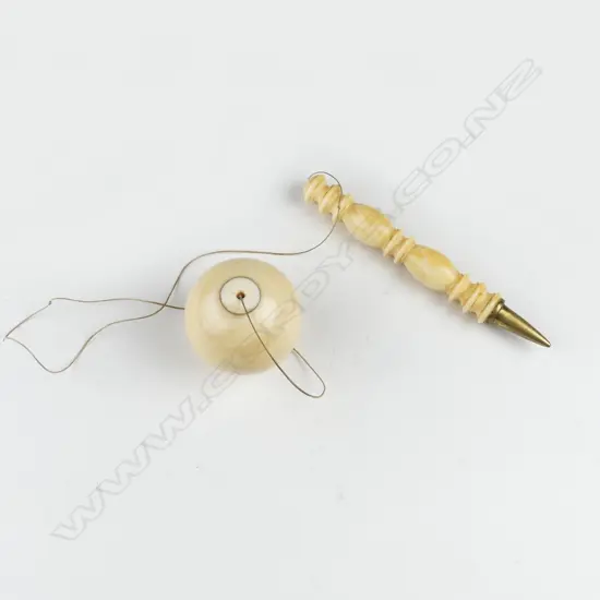 An ivory bilboquet (ball and catch) game