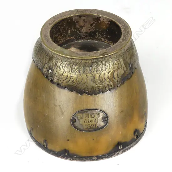 A late Victorian silver plate and horse hoof inkwell holder