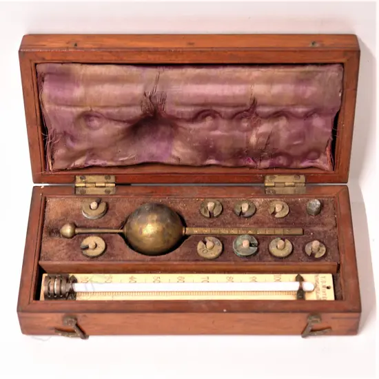 A Victorian Sikes hydrometer in original fitted mahogany case