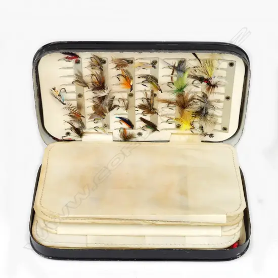 A black lacquer tin fly box