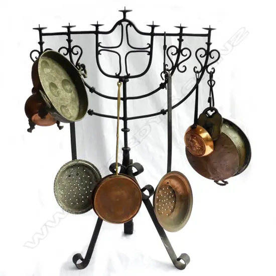 A wrought iron menorah candle stand