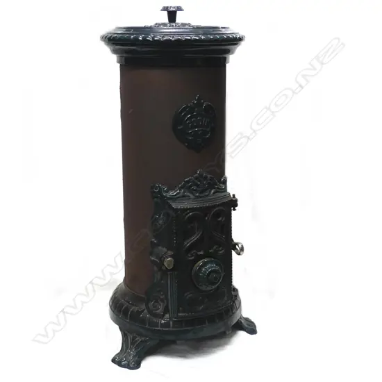 A circa 1900 Godin enamel and steel coal burning heater