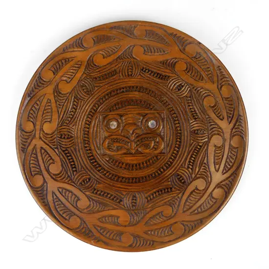 A Maori carved kauri wall plaque